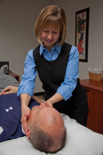 Judy Culbertson, PT, MLDT with a patient